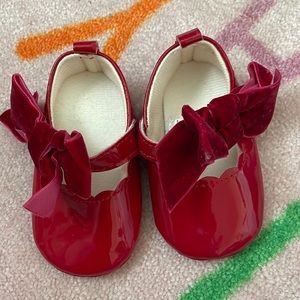 Red babygirl shoes, soft soul.